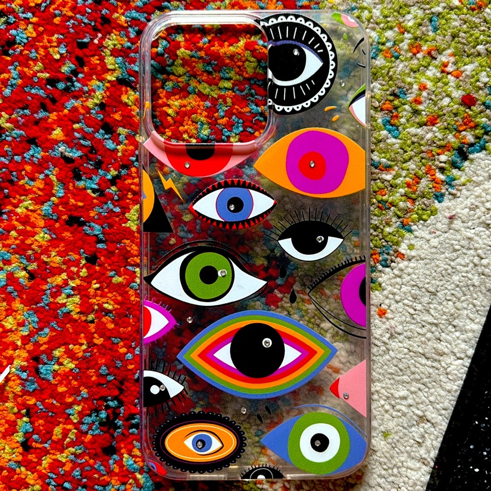 Evil eye case with diamonds in between nice slim fit case used twice so cute
